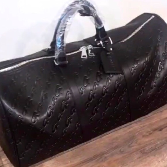 Handbags - GLAMAHOLIC matte black duffle bag